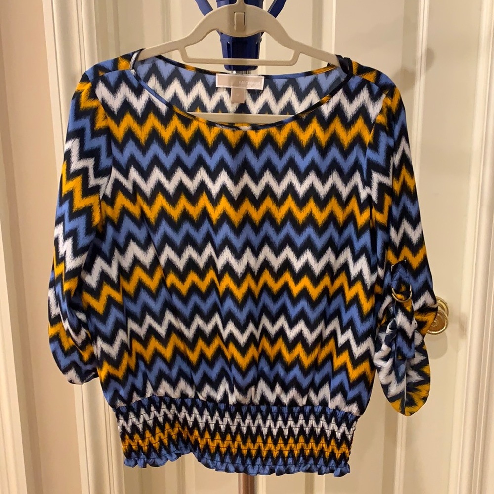 Michael Kors blouse with buckles on arms